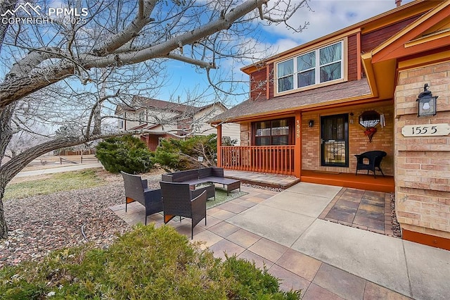 view of patio with an outdoor fire pit