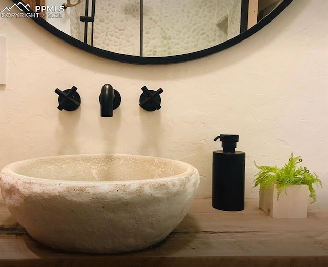 bathroom with hardwood / wood-style flooring