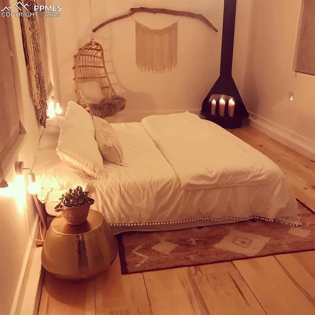 bedroom featuring hardwood / wood-style floors