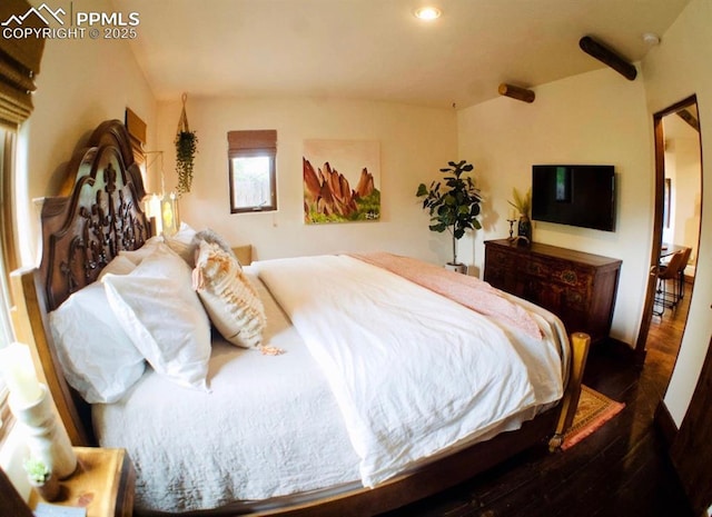 bedroom featuring dark wood-type flooring