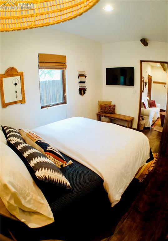 bedroom featuring dark hardwood / wood-style floors