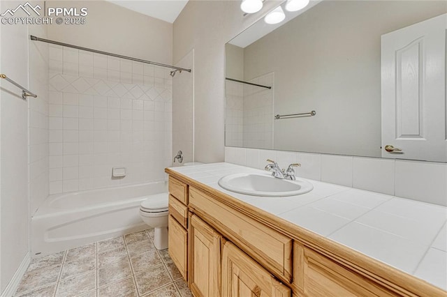 full bathroom featuring toilet, vanity, and shower / bathing tub combination