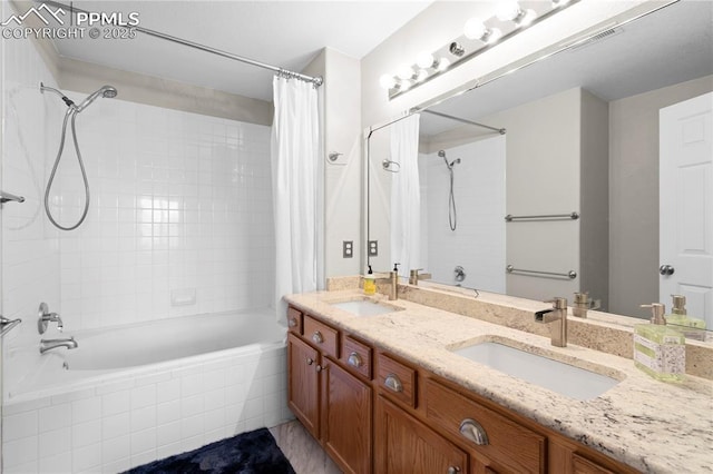 bathroom with vanity and shower / bathtub combination with curtain