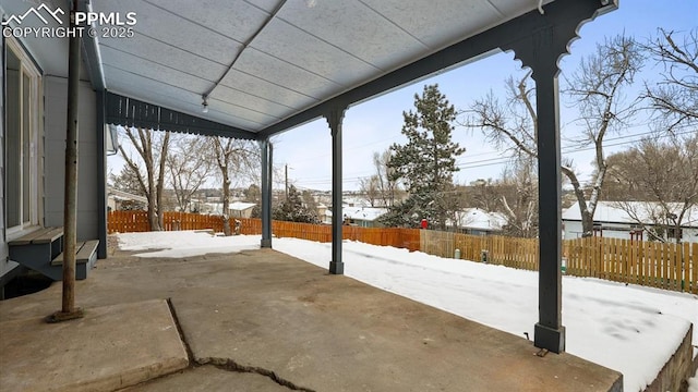 view of snow covered patio