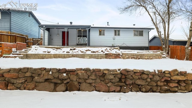 view of snow covered property