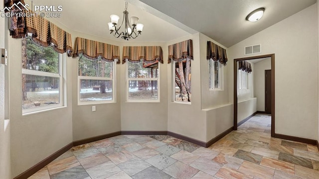 interior space with an inviting chandelier