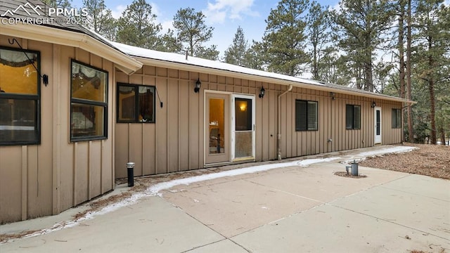 back of property featuring a patio