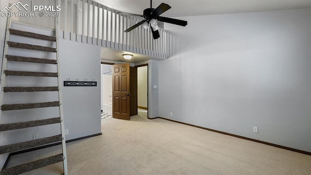 interior space featuring ceiling fan