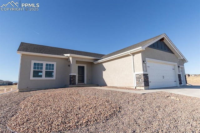 single story home featuring a garage