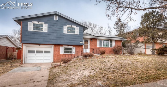 split level home with a garage