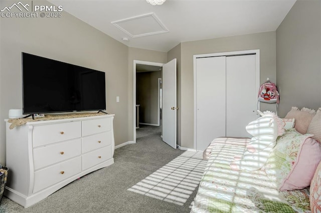 bedroom with a closet and light colored carpet