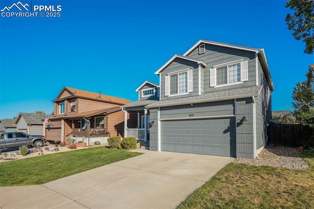 front of property with a porch, a garage, and a front lawn