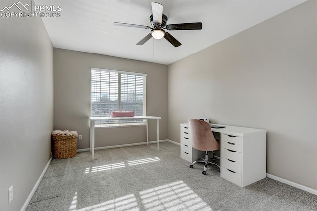 home office featuring ceiling fan and light colored carpet