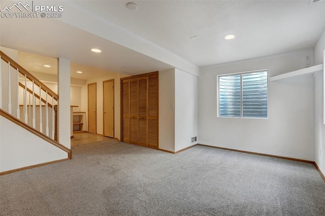 spare room with carpet floors