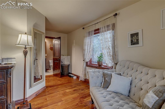 living area featuring light hardwood / wood-style floors