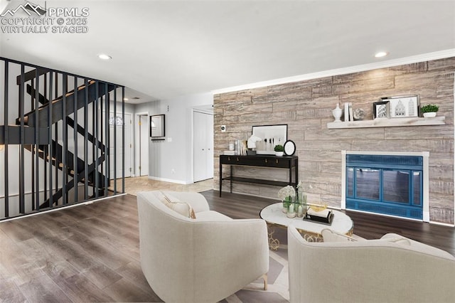 living room featuring a fireplace and hardwood / wood-style floors