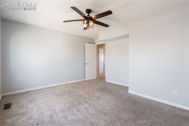 empty room with carpet and ceiling fan