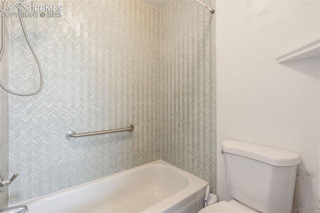 bathroom with toilet and shower / bath combination