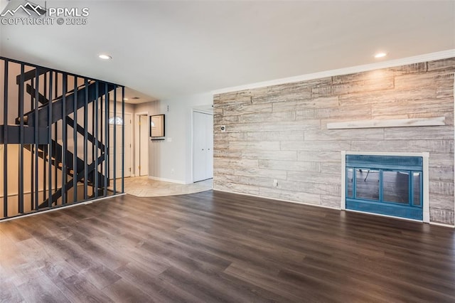 unfurnished living room featuring wood-type flooring