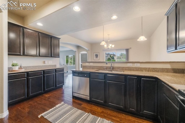 kitchen featuring dark hardwood / wood-style flooring, sink, decorative light fixtures, a notable chandelier, and dishwasher