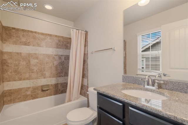 full bathroom featuring vanity, toilet, and shower / tub combo with curtain