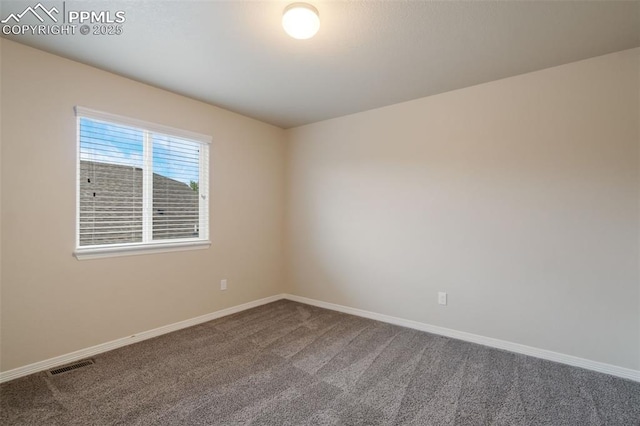 view of carpeted spare room