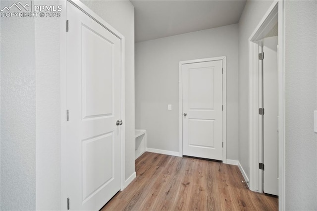 hall featuring light wood-type flooring