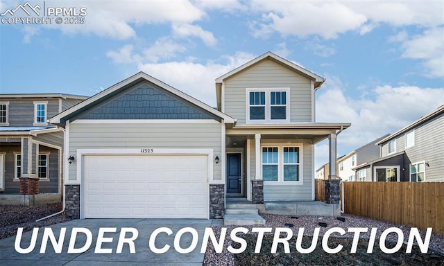 craftsman house featuring a garage