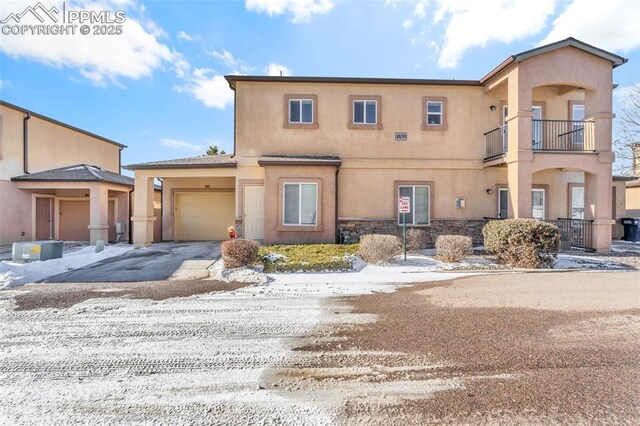 view of front of property with a garage