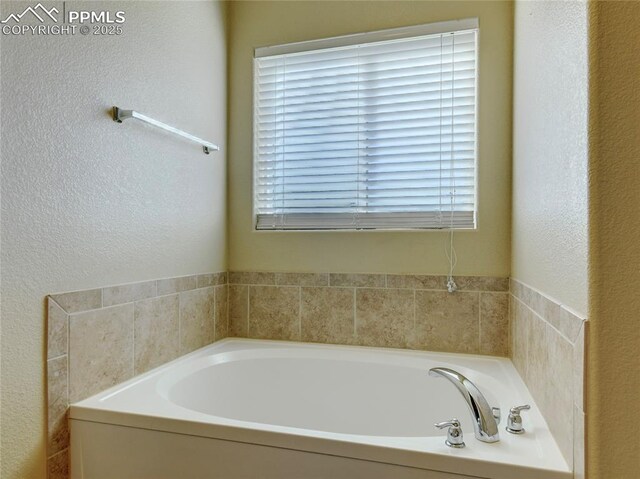 1235 Woodmoor Acres Dr, Monument, CO 80132 - bathroom featuring a washtub