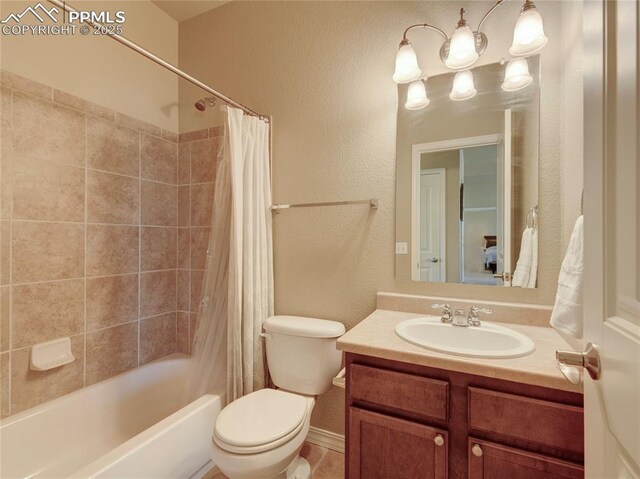 1235 Woodmoor Acres Dr, Monument, CO 80132 - full bathroom with shower / bath combination with curtain, toilet, and vanity