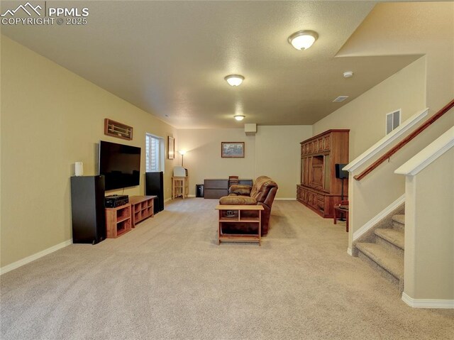 1235 Woodmoor Acres Dr, Monument, CO 80132 - living room featuring light colored carpet