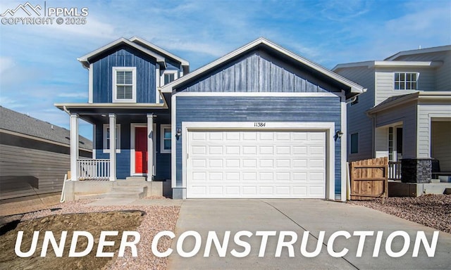 craftsman inspired home with a porch and a garage