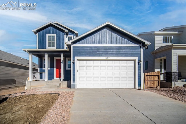 view of front of home featuring a porch and a garage