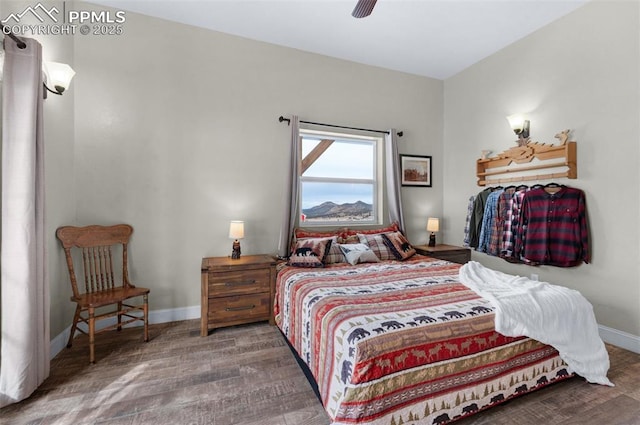 bedroom featuring hardwood / wood-style floors and ceiling fan