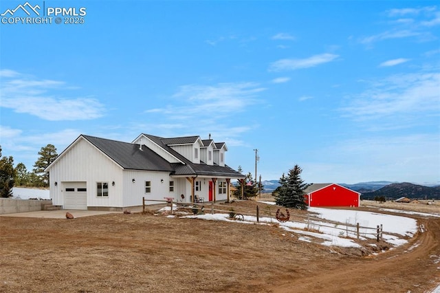 view of front of house with a mountain view