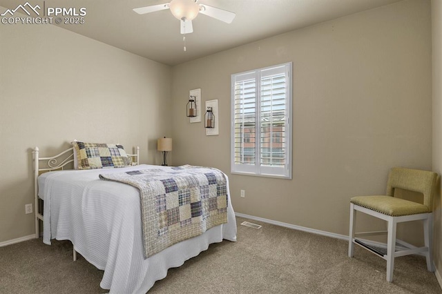 carpeted bedroom featuring ceiling fan