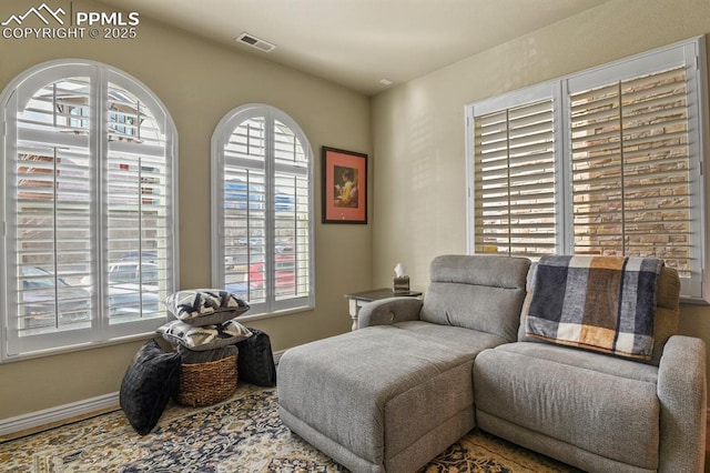 sitting room with a healthy amount of sunlight