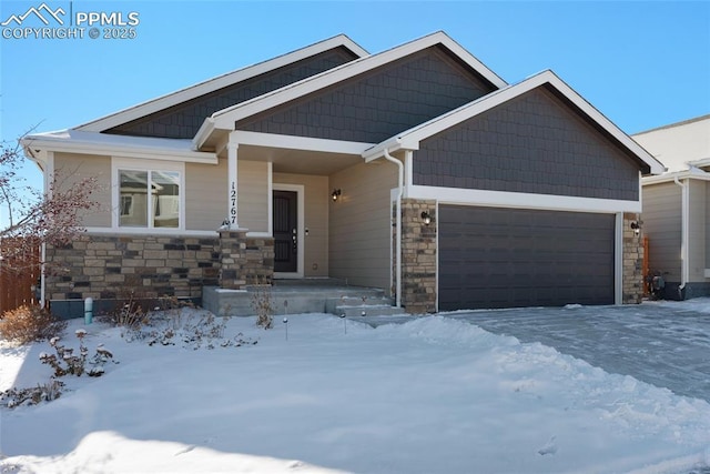 craftsman-style home featuring a porch and a garage