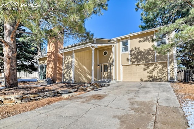 view of front of home with a garage