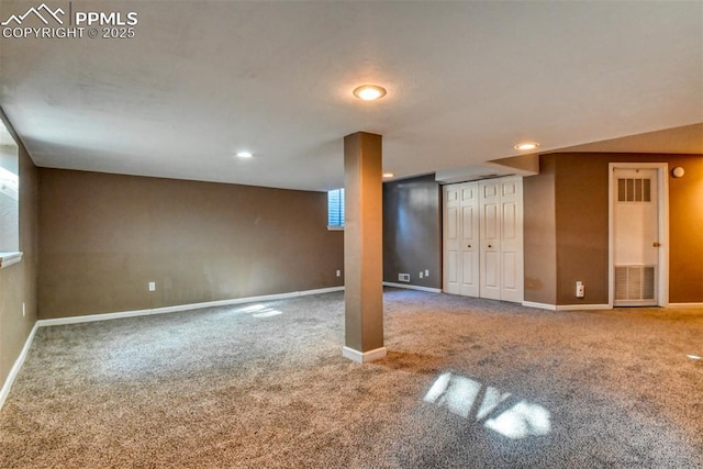 basement featuring carpet flooring