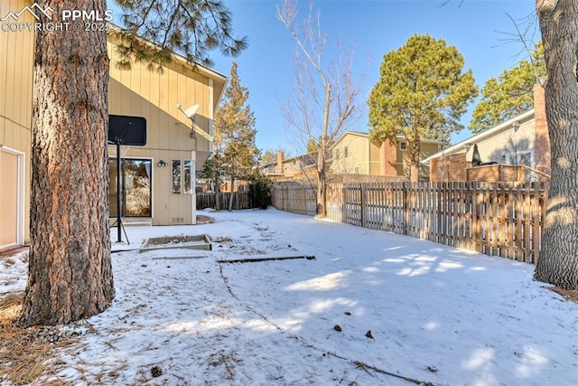 view of snowy yard