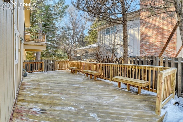 view of snow covered deck