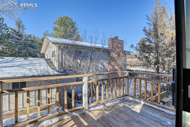 view of snow covered deck