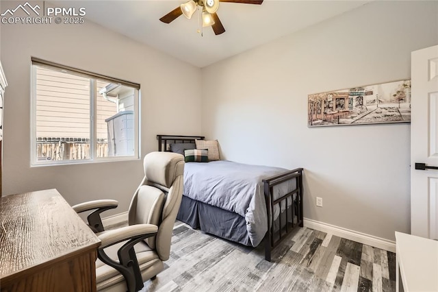 bedroom featuring hardwood / wood-style floors and ceiling fan