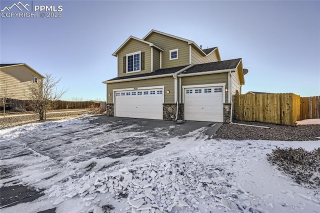 view of front of property featuring a garage