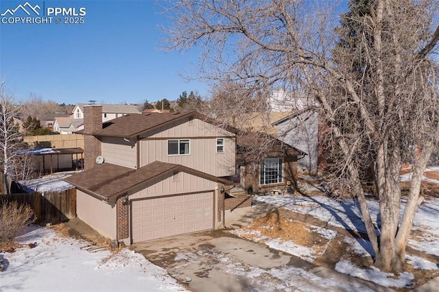 front of property with a garage