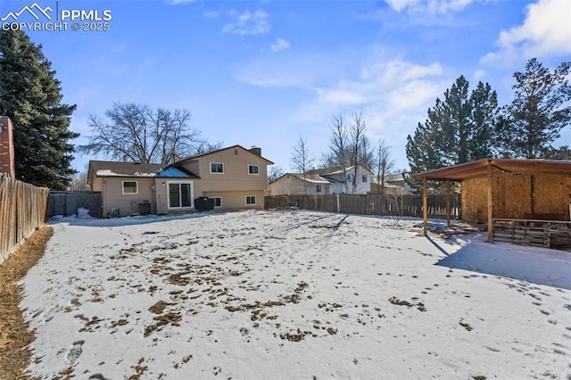 view of yard covered in snow