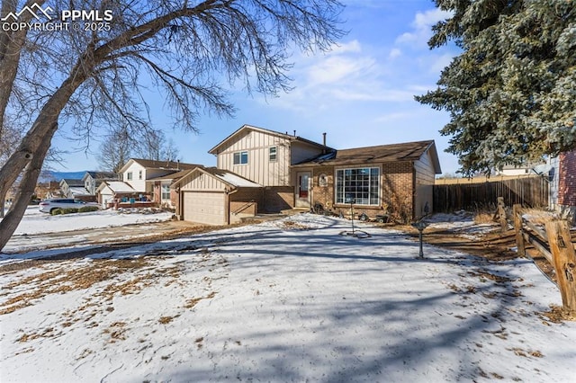 view of front of property featuring a garage