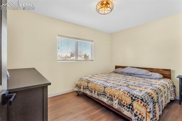 bedroom featuring dark hardwood / wood-style floors